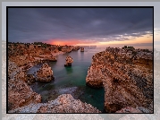 Wybrzeże, Skały, Zachód słońca, Morze, Region Algarve, Portugalia