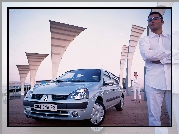 Man in white car in metalic  Clio 2