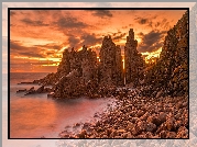 Australia, Wyspa Phillip Island, Przylądek Cape Woolamai, Morze, Zachód słońca, Skały, Kamienie